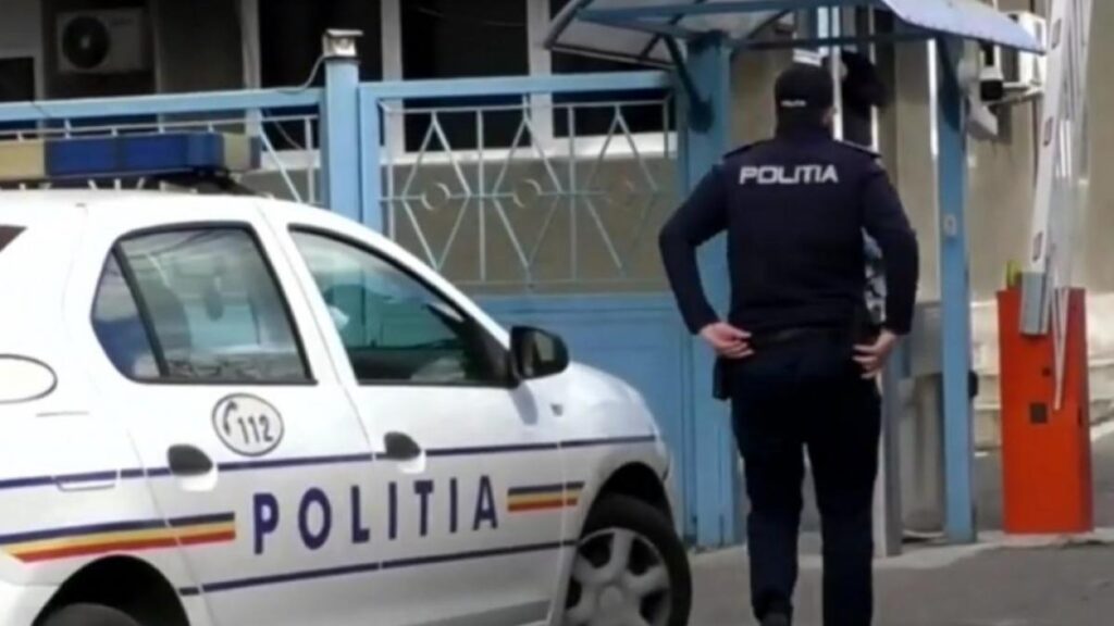 Bărbat venit să îl susțină pe Călin Georgescu, dus la secția de poliție din cauza steagului legionar