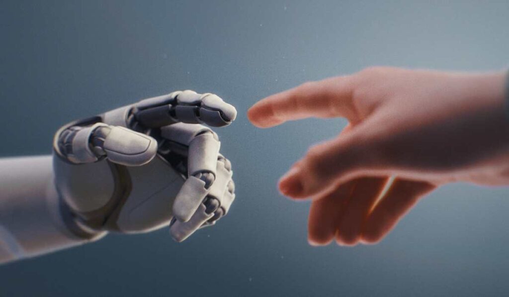 Robot umanoid și o persoană în timp ce își ating degetele