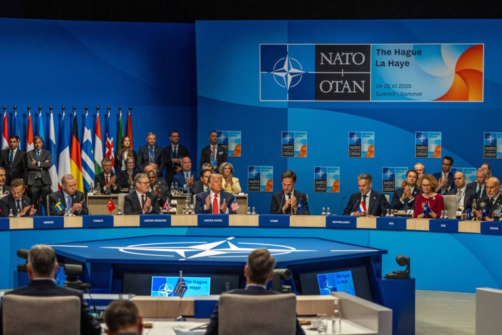 Bancă globală pentru apărare, pe agenda summitului NATO. Canada caută sprijinul a zece țări "NATO Summit: Canada Seeks Support from Ten Nations for Global Defense Bank Initiative"