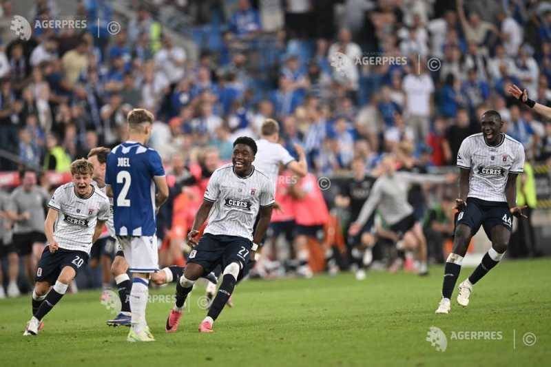 Fotbal: Aarhus realizează o calificare spectaculoasă în turul al treilea preliminar al Ligii Campionilor "Aarhus Impresionează cu O Calificare Spectaculoasă în Turul Trei Preliminar al Ligii Campionilor"